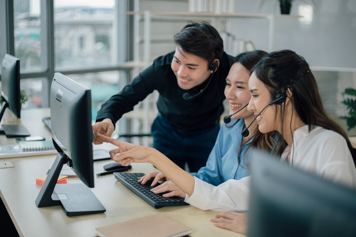 Call Center Agents Collaborating at the Office